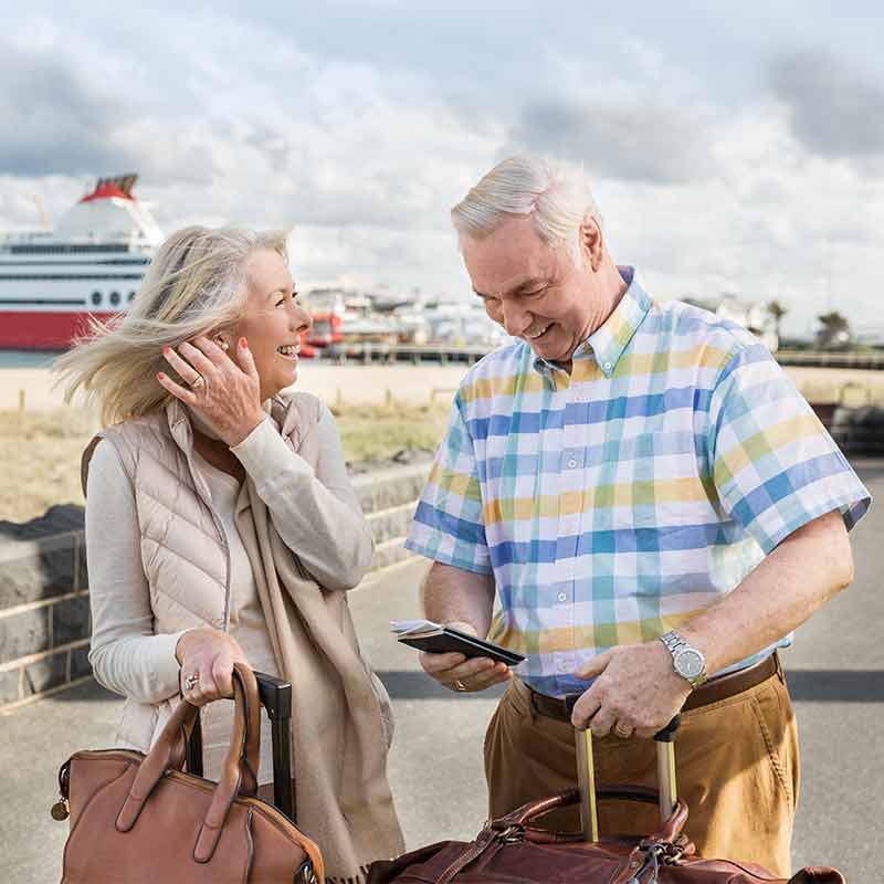 Couple with hearing aids going on vacation 