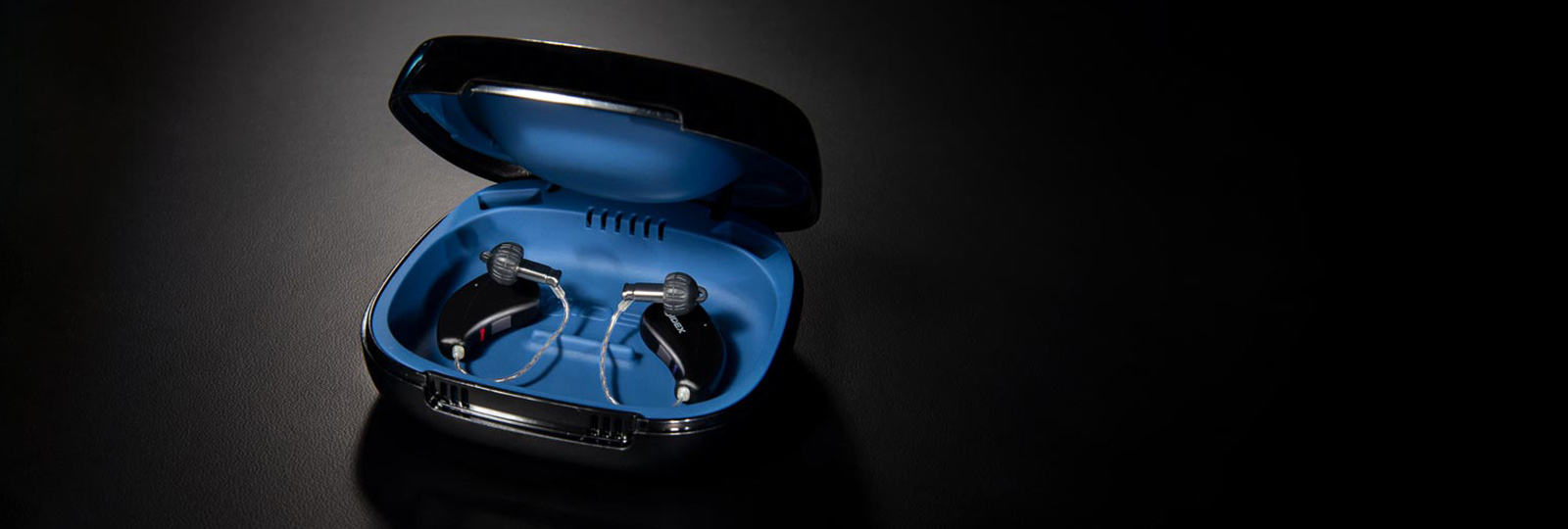 Widex Moment Hearing aids in open case